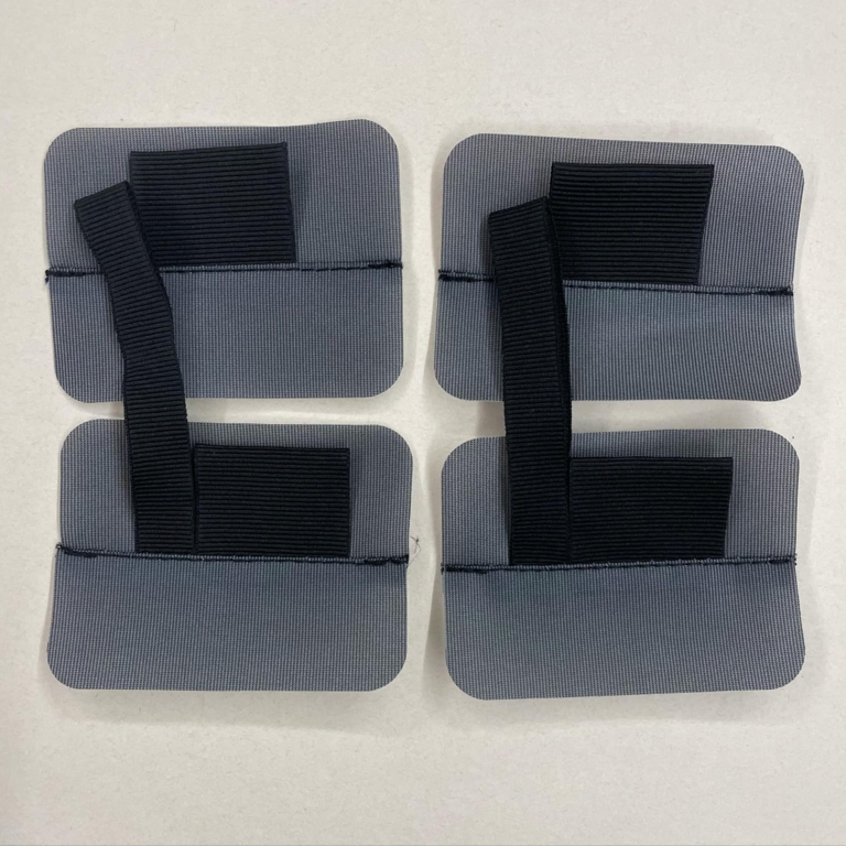 Ursuit fästen för hängslen i torrdräkter. Limmas fast